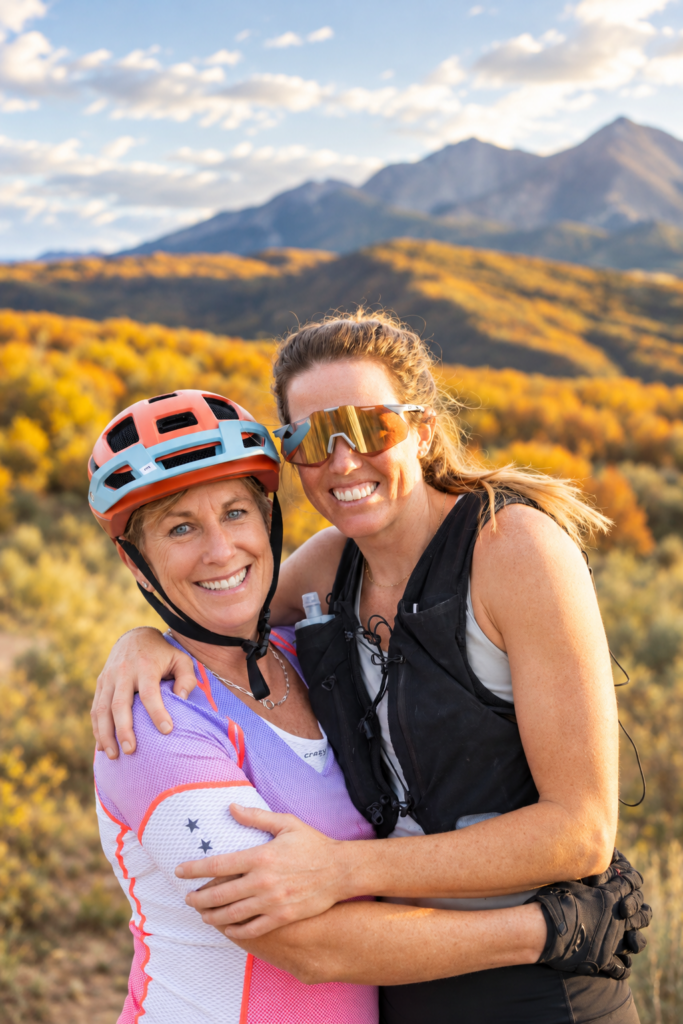 Maria and friend embracing in Prince Creek